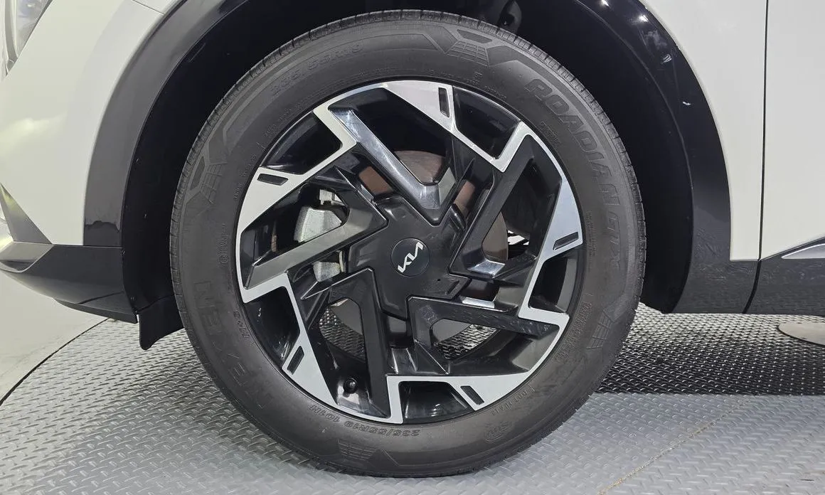 Kia Sportage — фото 9