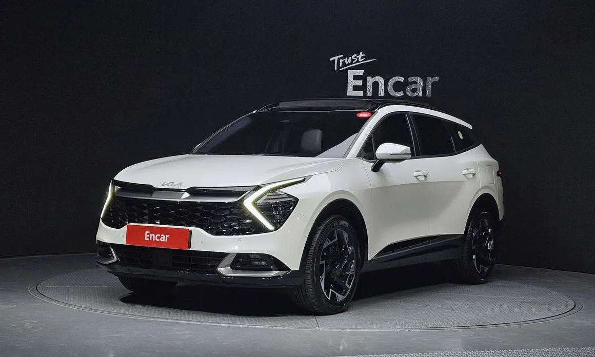 Kia Sportage — фото 1