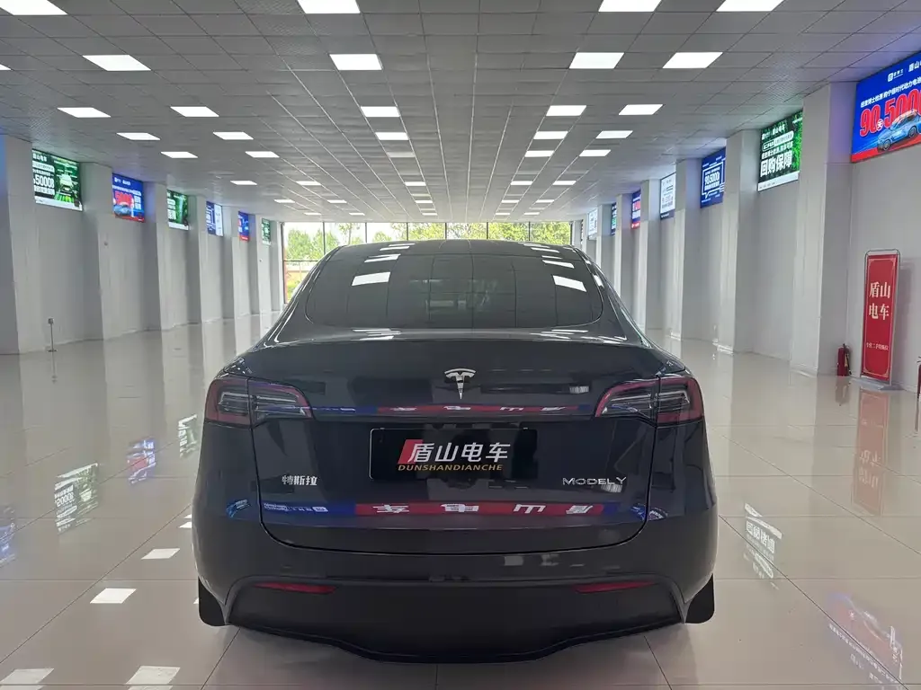 Tesla Model Y — фото 7