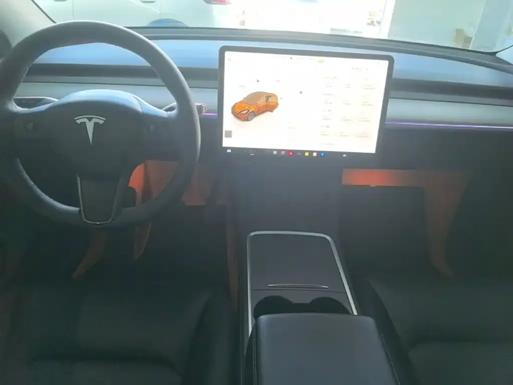 Tesla Model Y — фото 10