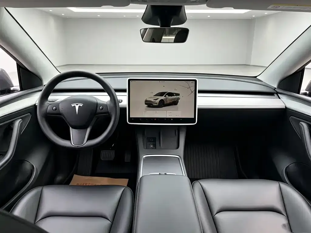 Tesla Model Y — фото 5