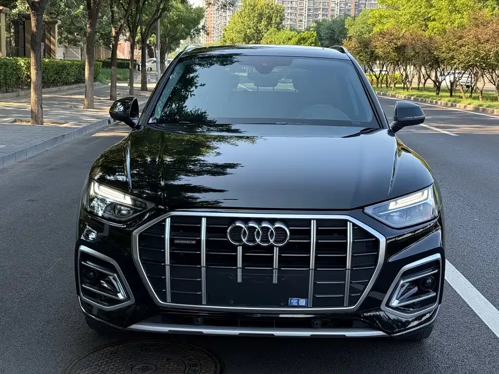 Audi Q5L — фото 9