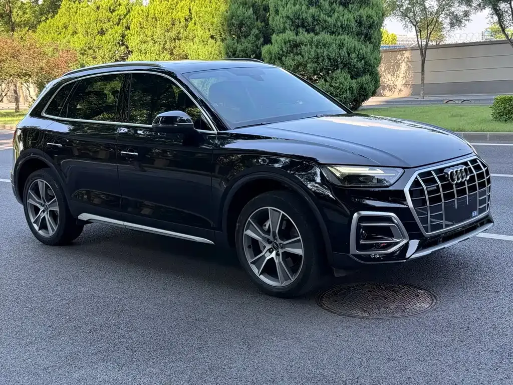 Audi Q5L — фото 10