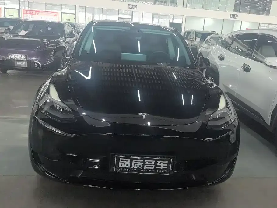 Tesla Model Y — фото 6