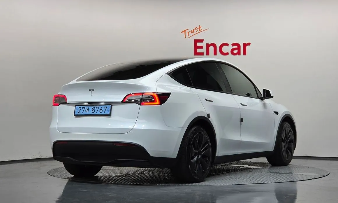 Tesla Model Y — фото 6