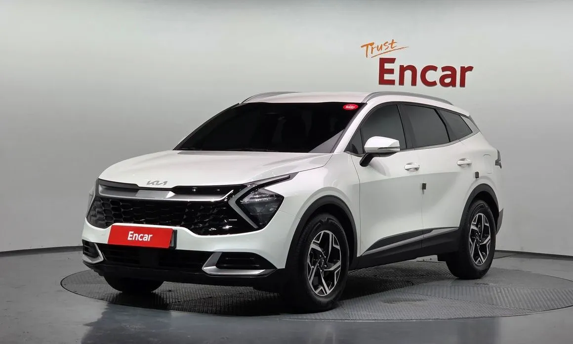 Kia Sportage — фото 1