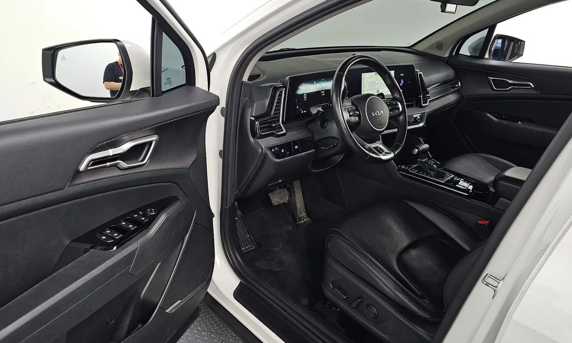 Kia Sportage — фото 7