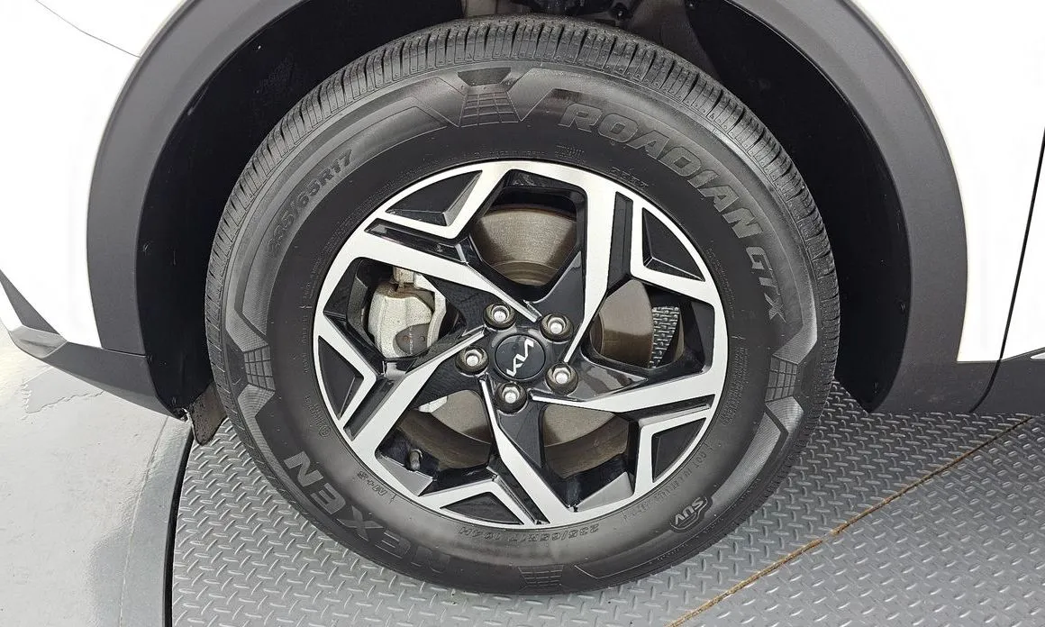 Kia Sportage — фото 10