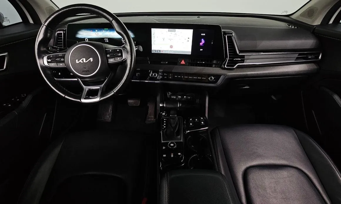 Kia Sportage — фото 8