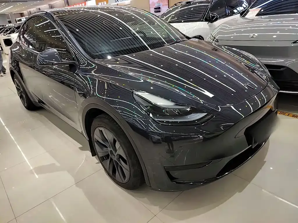Tesla Model Y — фото 10