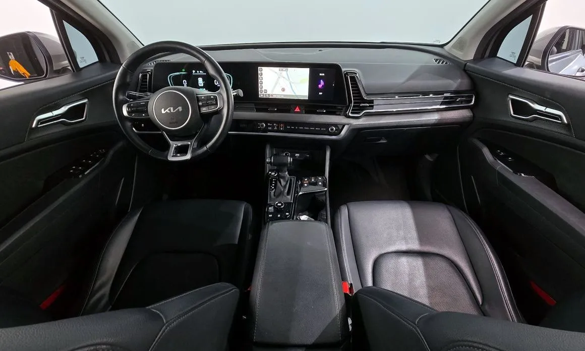 Kia Sportage — фото 10