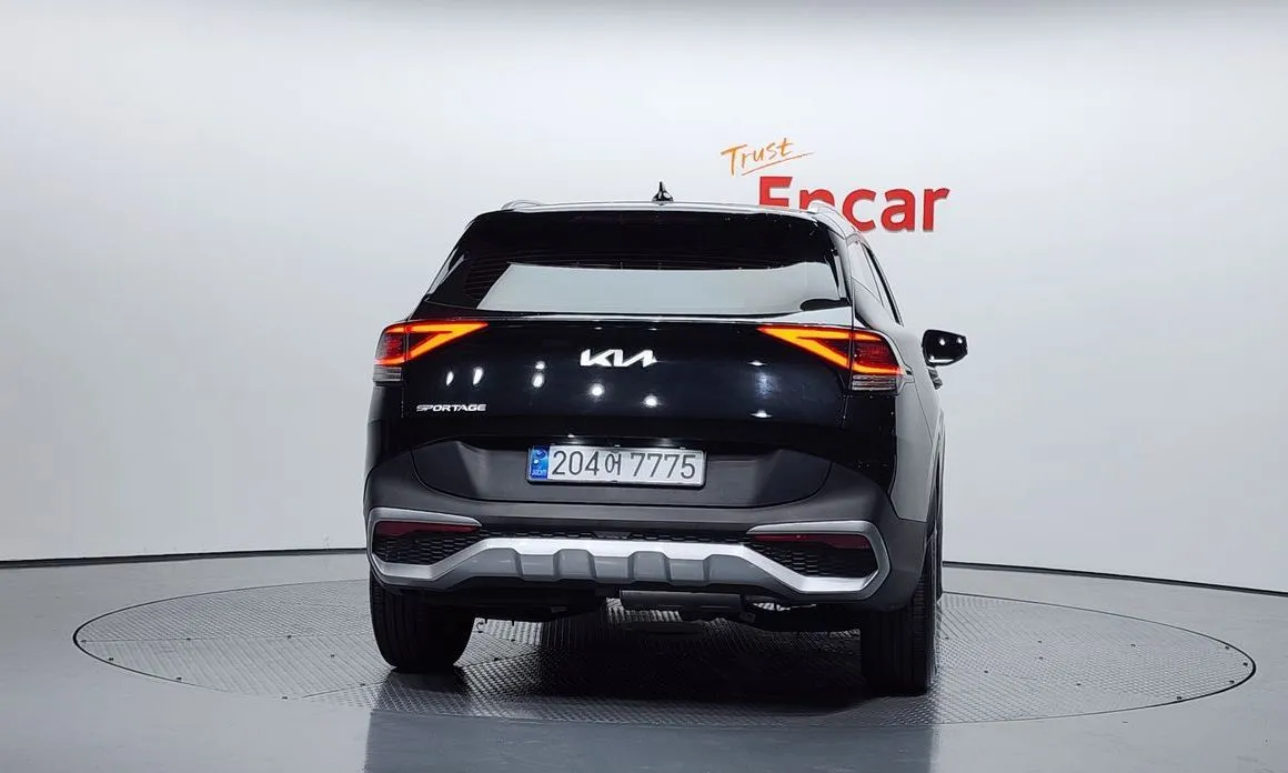 Kia Sportage — фото 10