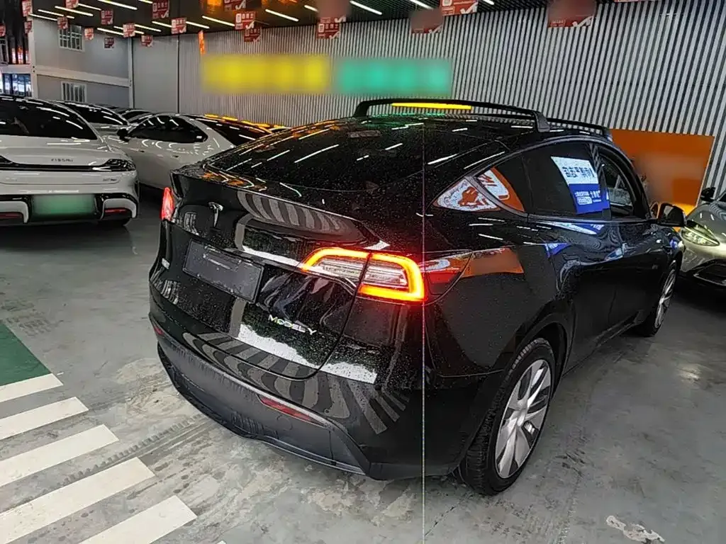 Tesla Model Y — фото 10