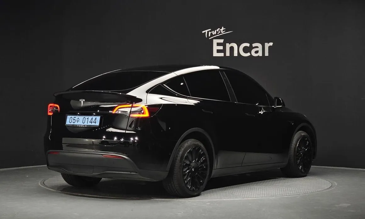 Tesla Model Y — фото 5