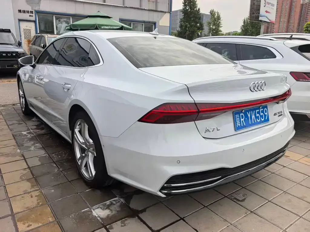 Audi A7L — фото 10