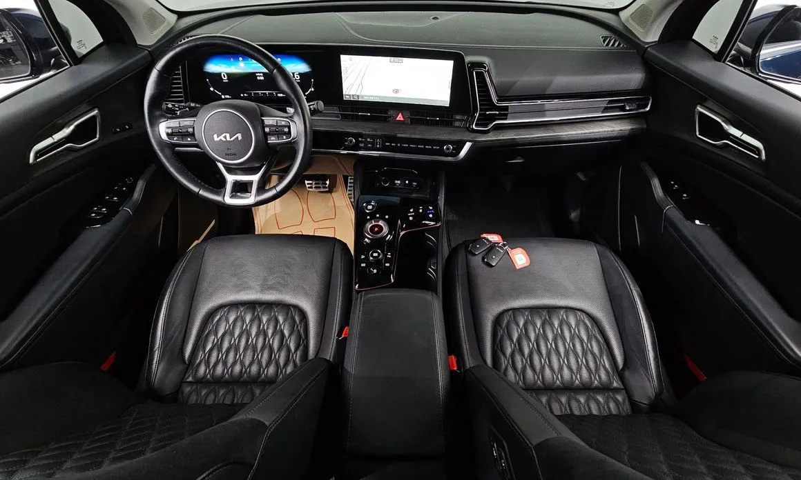 Kia Sportage — фото 10