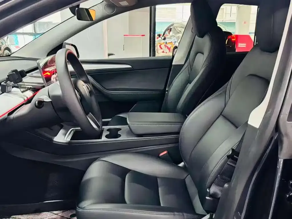 Tesla Model Y — фото 7