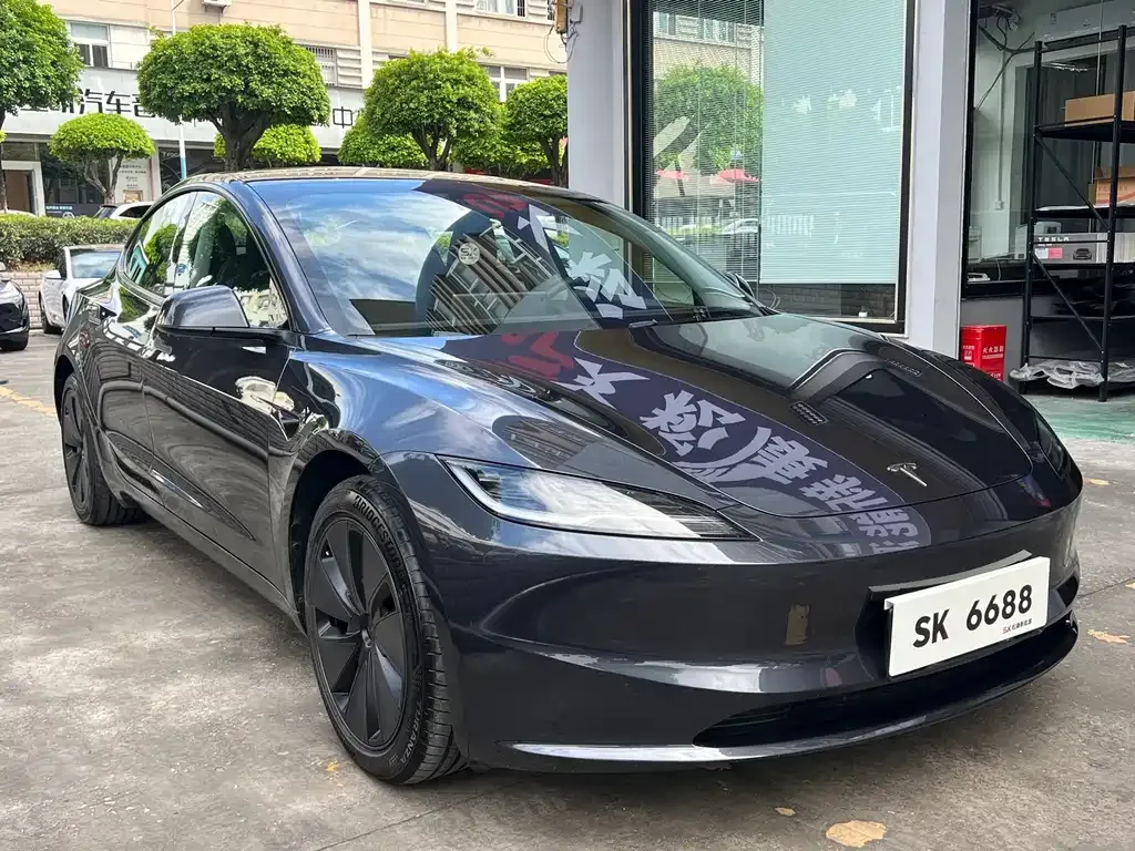 Tesla Model 3 — фото 7