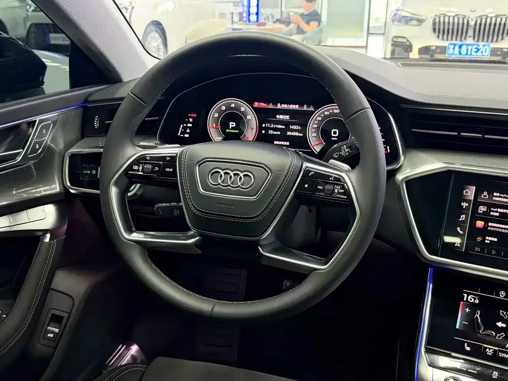 Audi A7L — фото 8