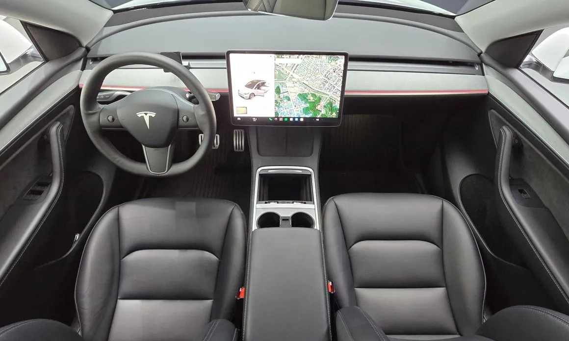 Tesla Model Y — фото 9