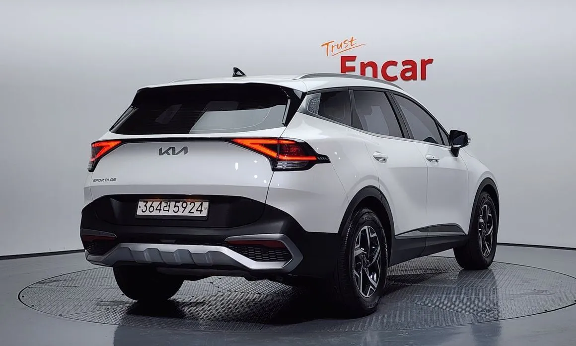 Kia Sportage — фото 10