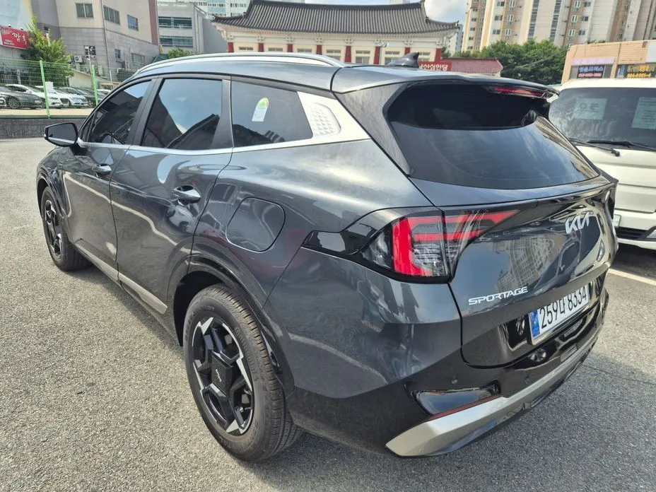 Kia Sportage — фото 10