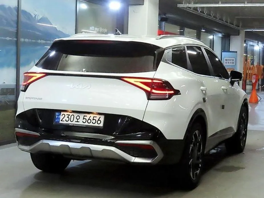 Kia Sportage — фото 9