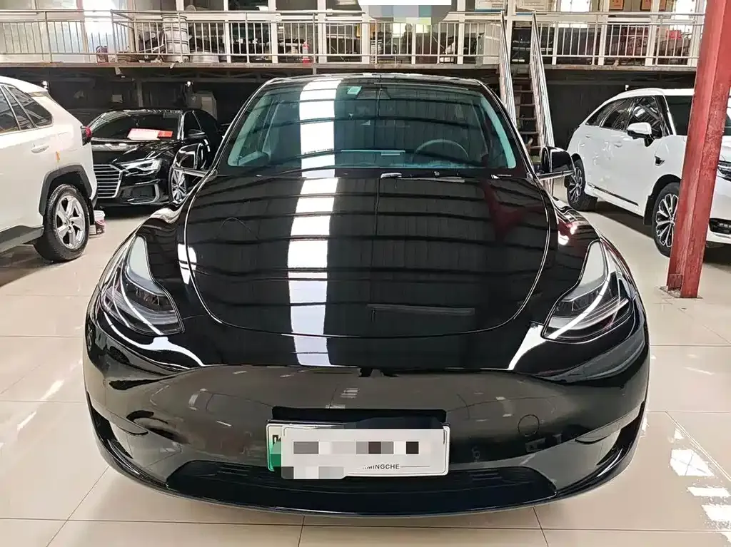 Tesla Model Y — фото 5