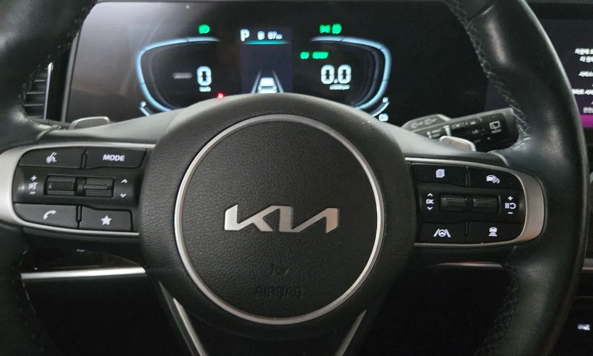 Kia Sportage — фото 10