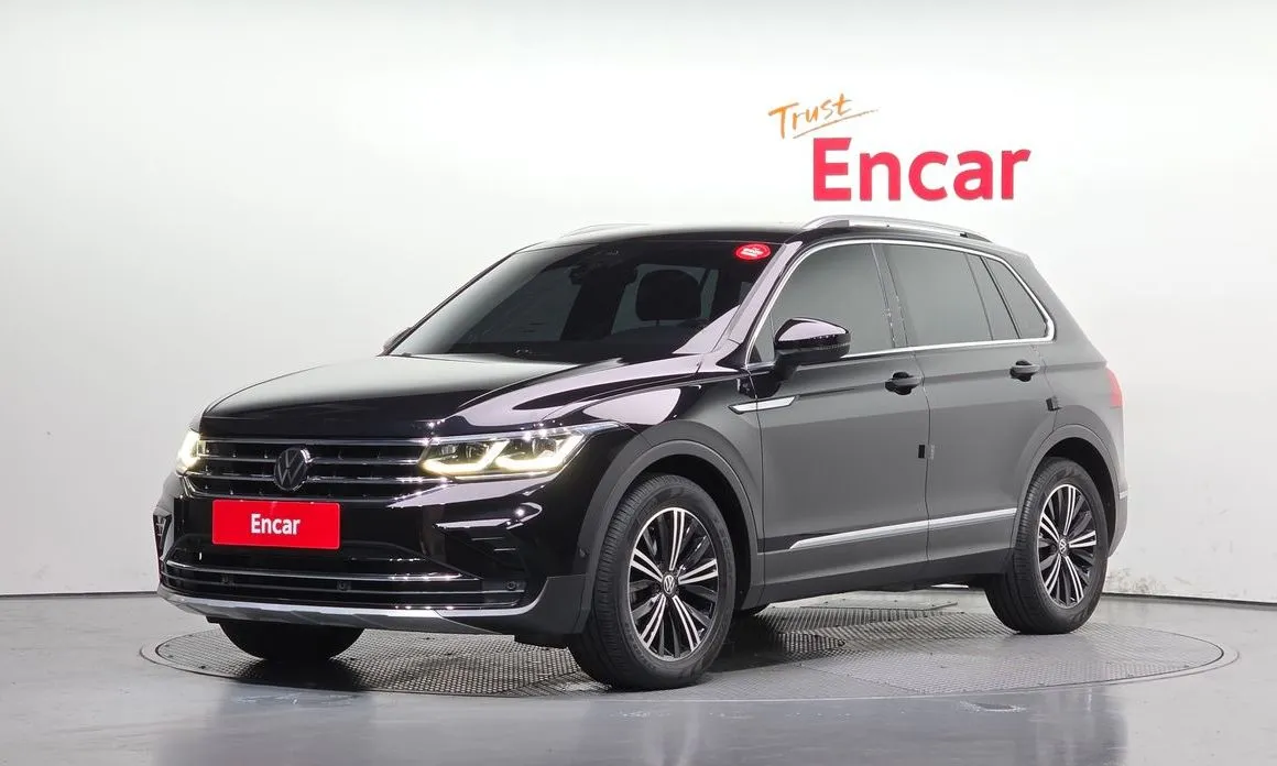 Volkswagen Tiguan — фото 1