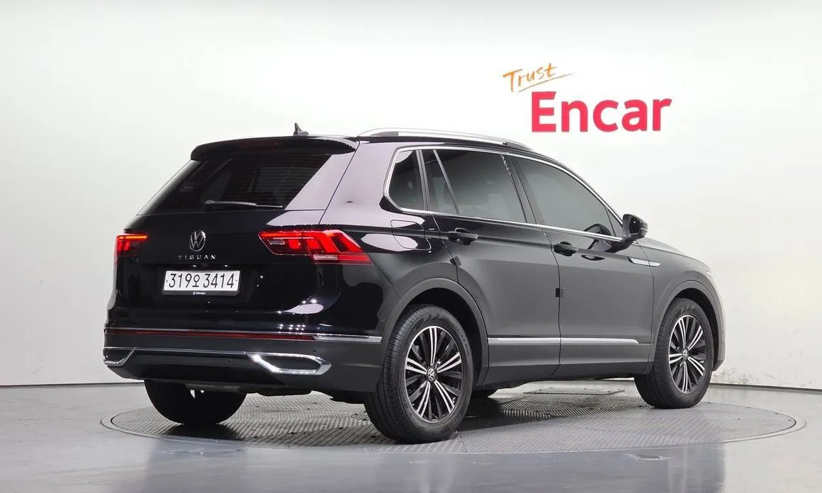 Volkswagen Tiguan — фото 10