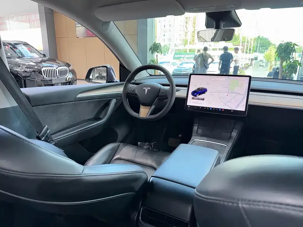 Tesla Model Y — фото 8