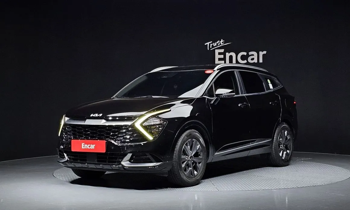 Kia Sportage — фото 1