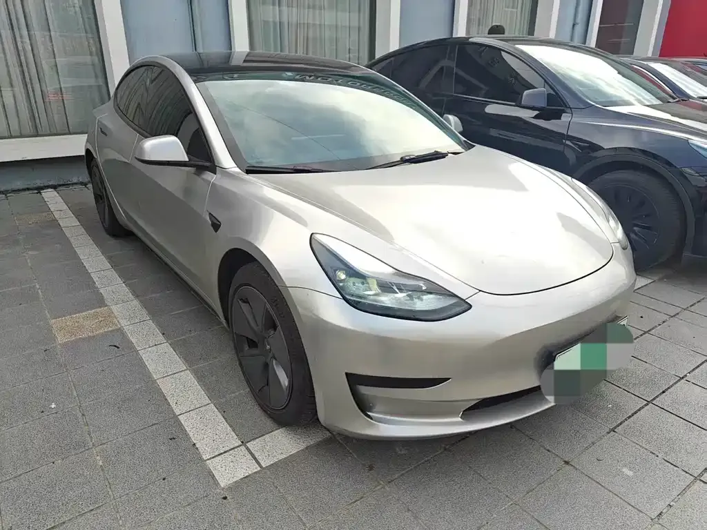 Tesla Model 3 — фото 9