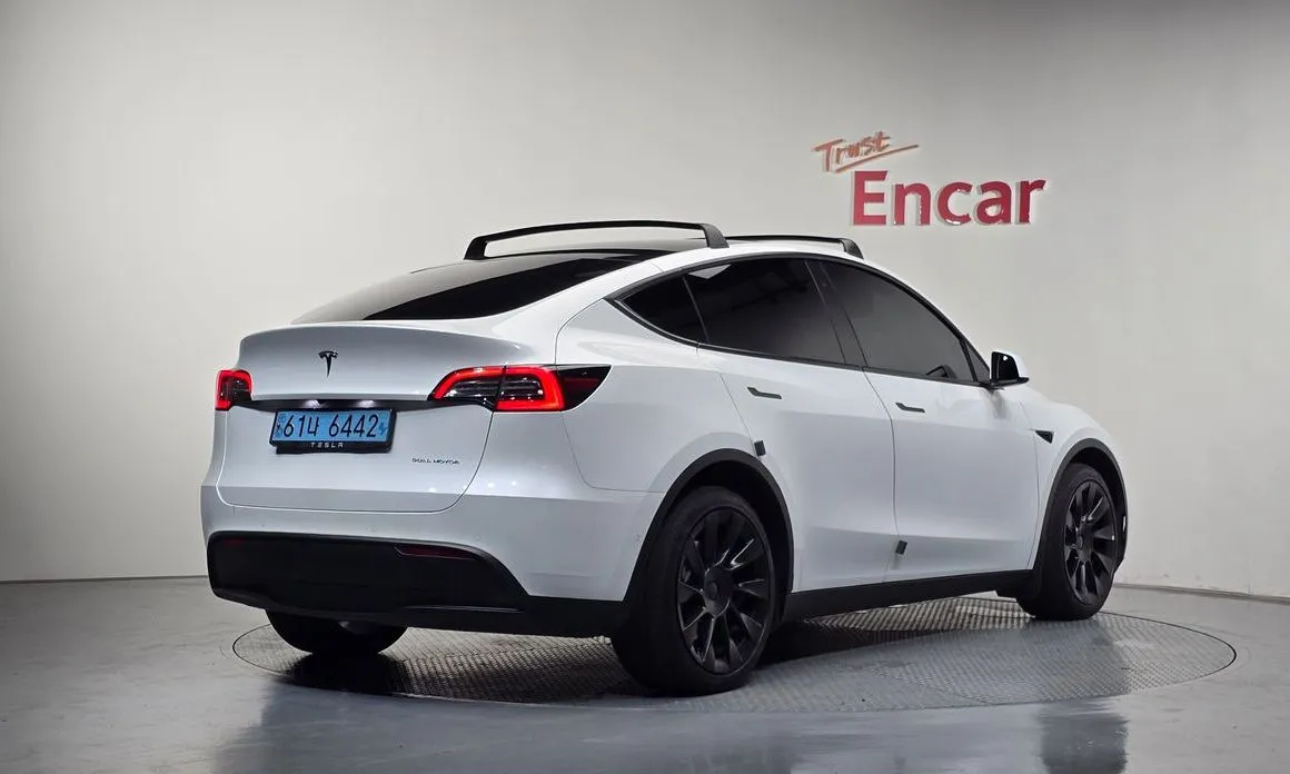 Tesla Model Y — фото 5