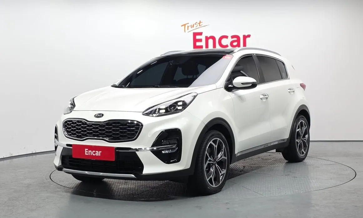 Kia Sportage — фото 1