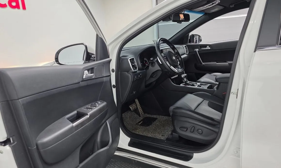 Kia Sportage — фото 6