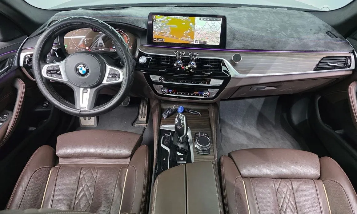 BMW 5-Series — фото 10