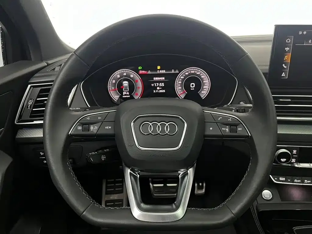 Audi Q5L — фото 10
