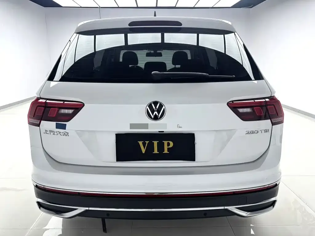 Volkswagen Tiguan L — фото 2