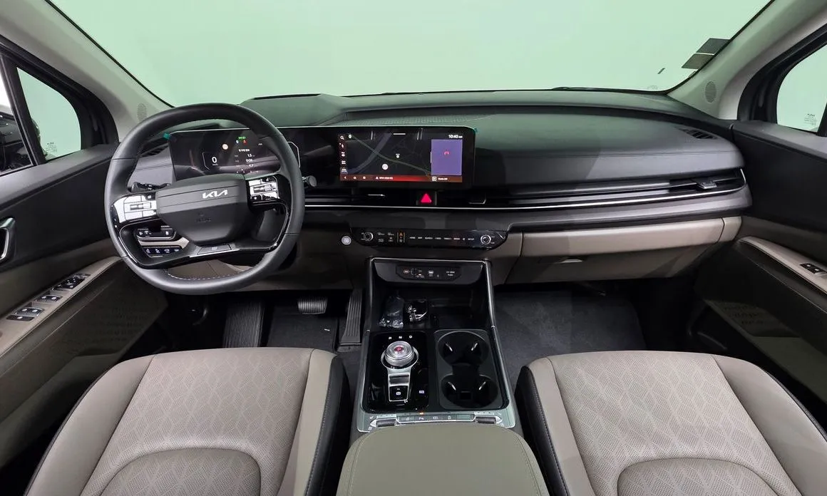 Kia Carnival — фото 10
