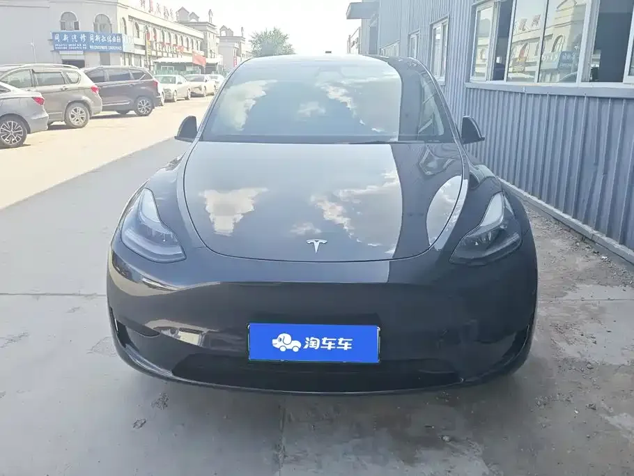 Tesla Model Y — фото 7