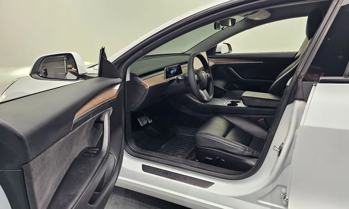Tesla Model 3 — фото 9