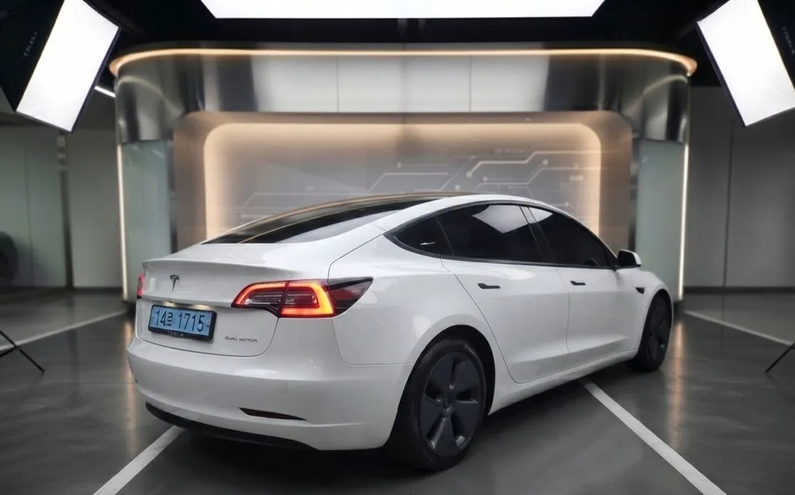 Tesla Model 3 — фото 9