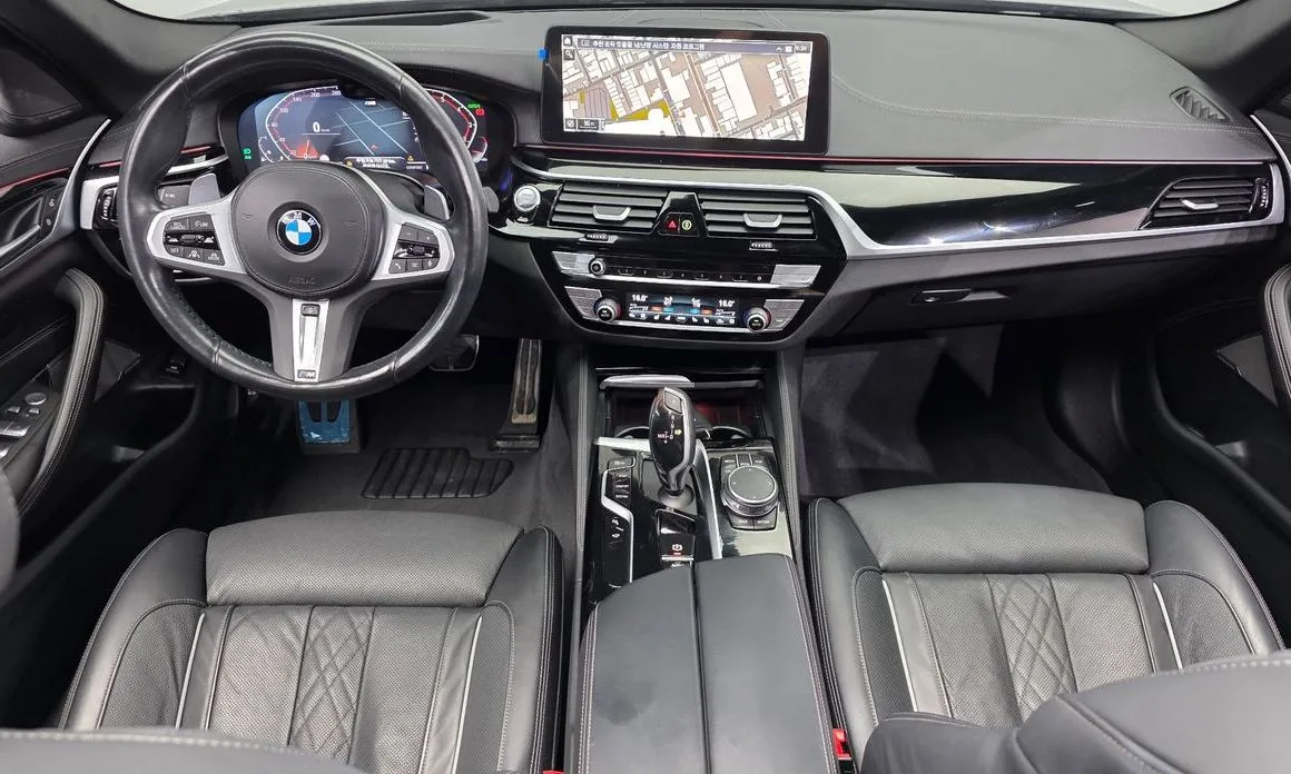 BMW 5-Series — фото 10