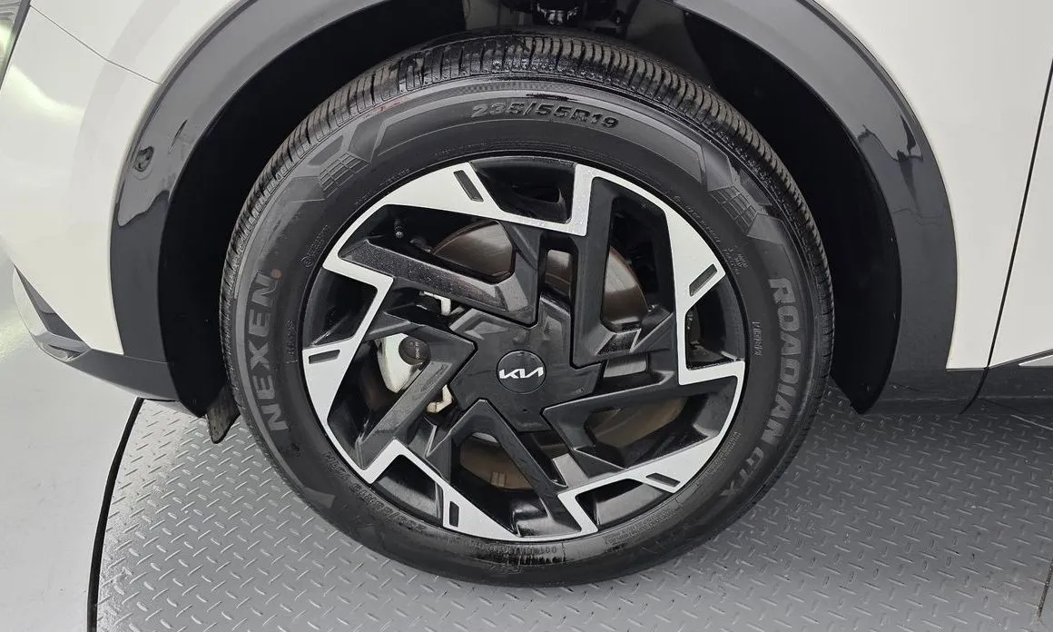 Kia Sportage — фото 9