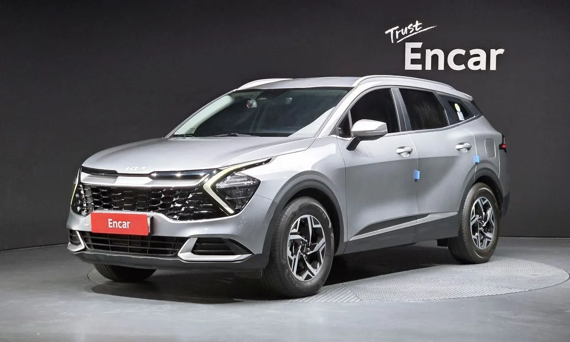 Kia Sportage — фото 1