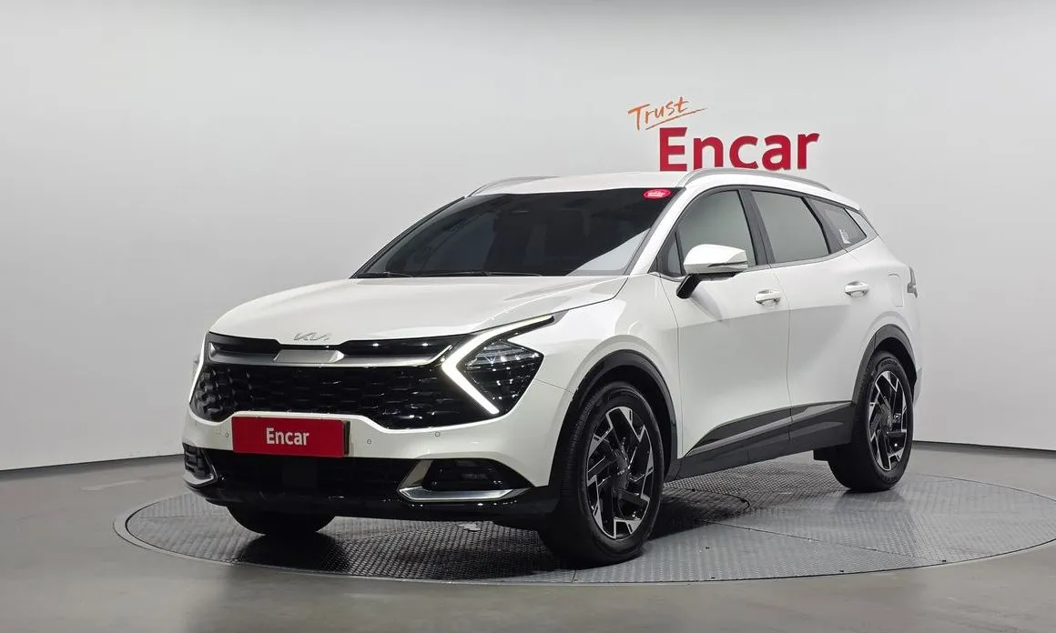 Kia Sportage — фото 1