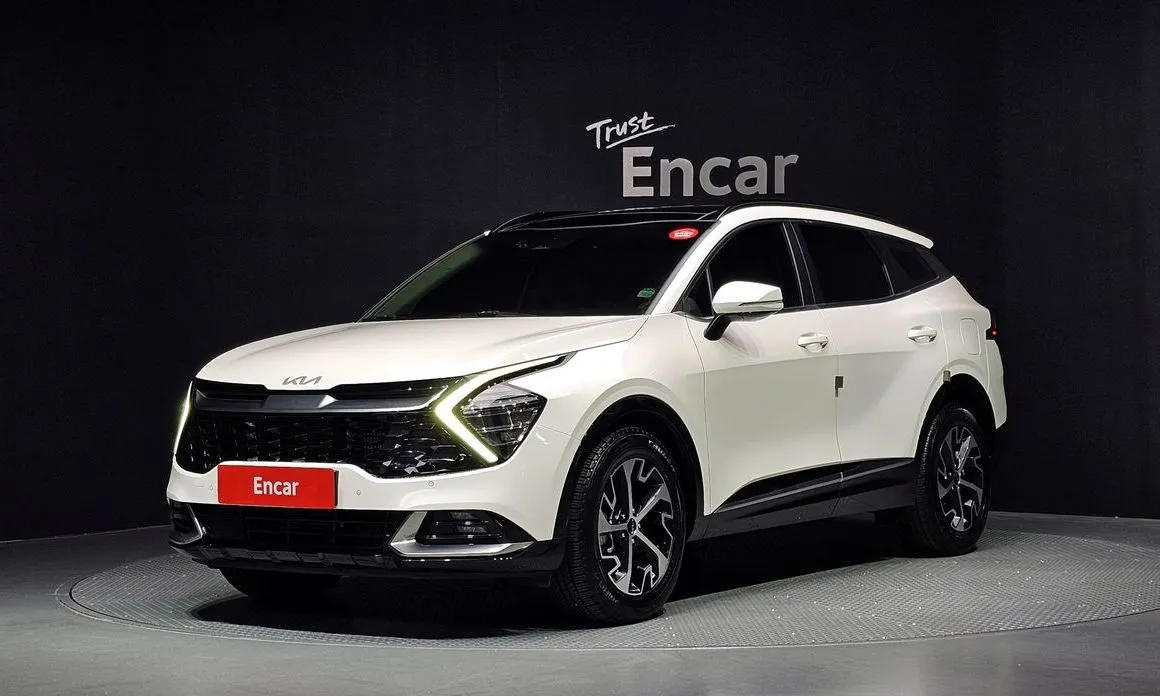 Kia Sportage — фото 1