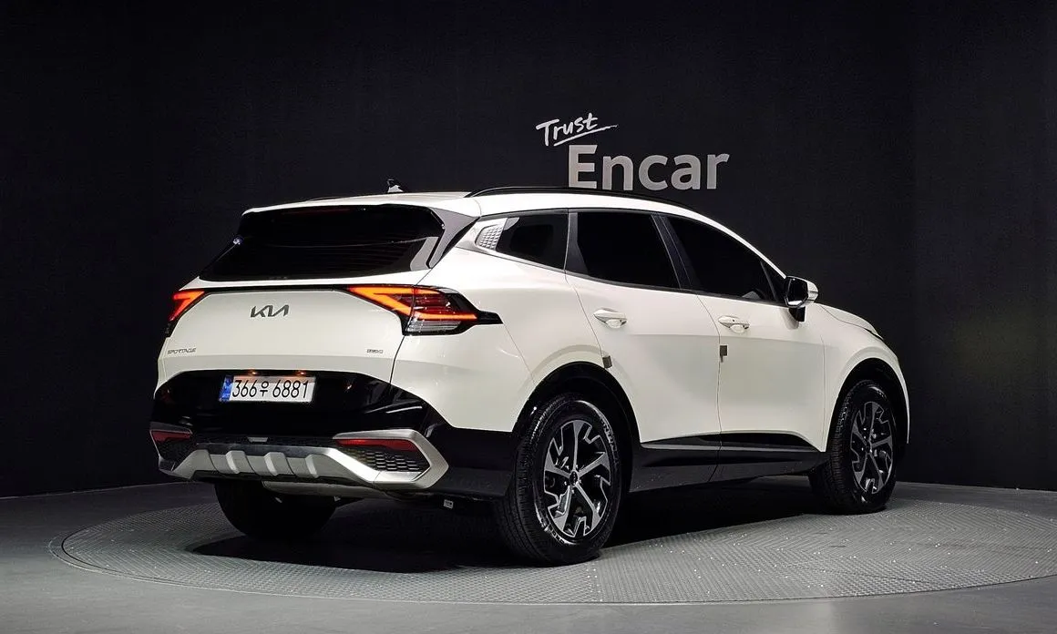 Kia Sportage — фото 7